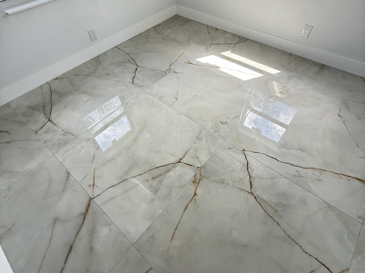 Large-format diagonal-laid porcelain tile flooring in a South Florida home